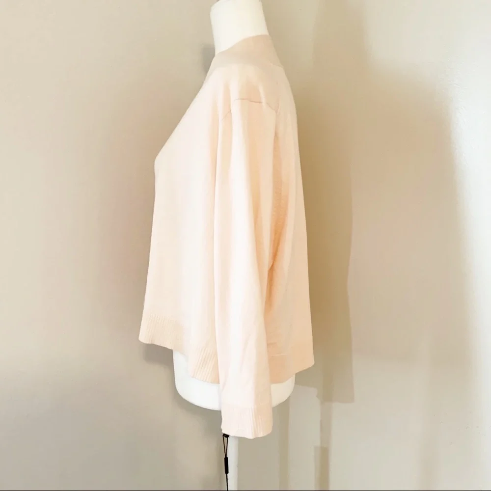 Calvin Klein NWT shrug light peach color